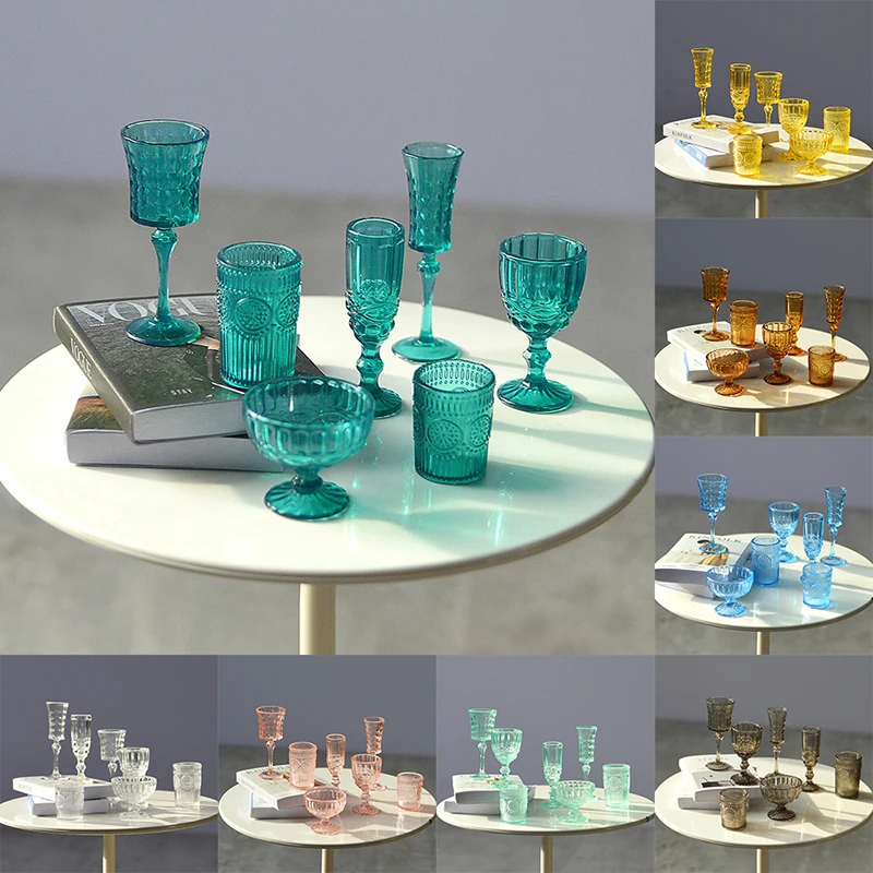 Miniature glasses showing detailed carved patterns and realistic proportions